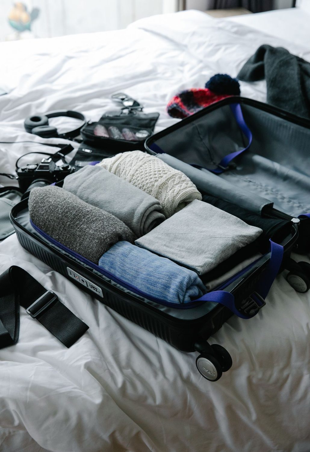 Folded clothes packed in an open suitcase
