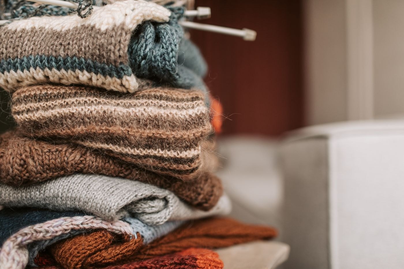Folded knitted sweaters in a stack