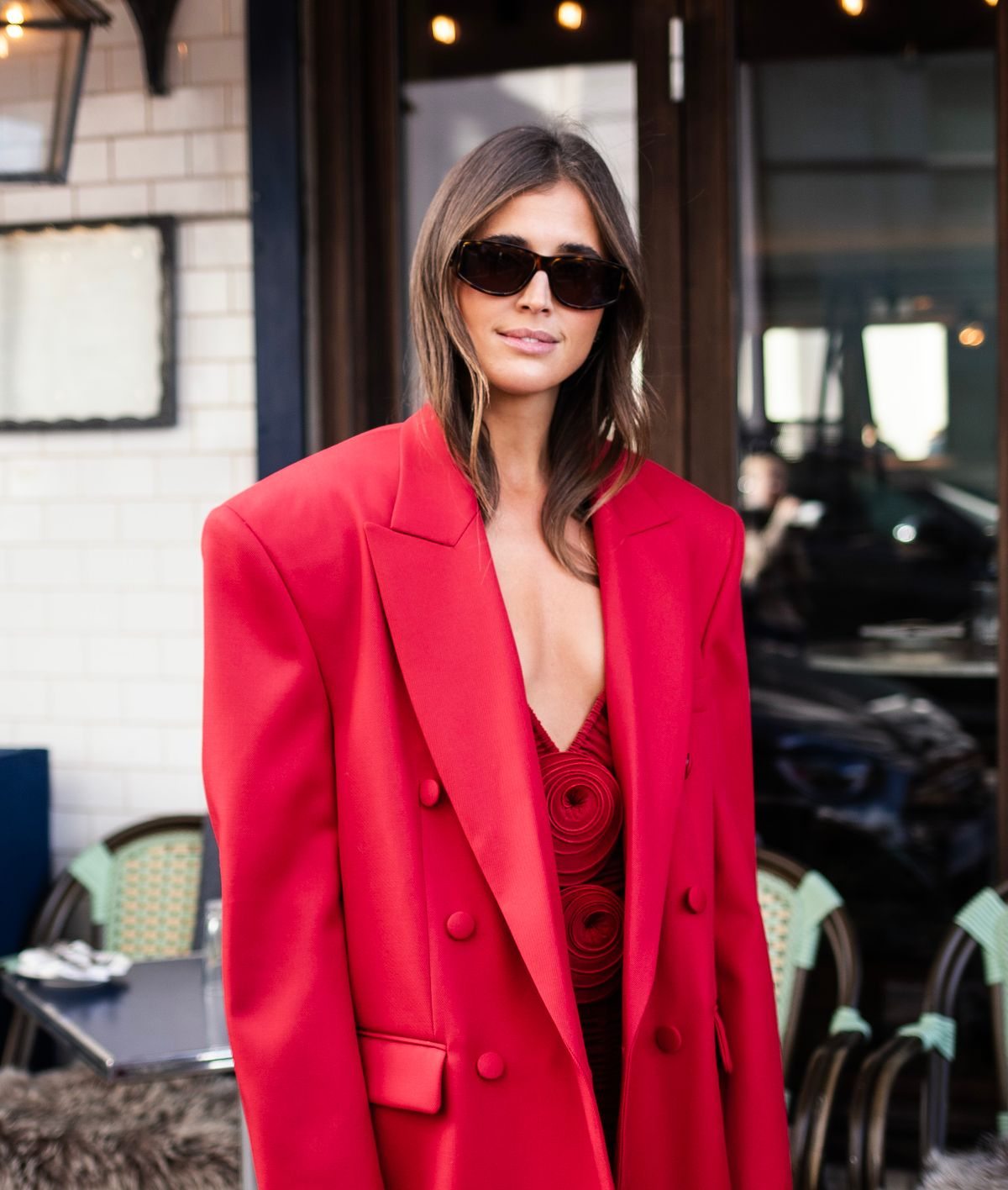 Red blazer worn on an urban street