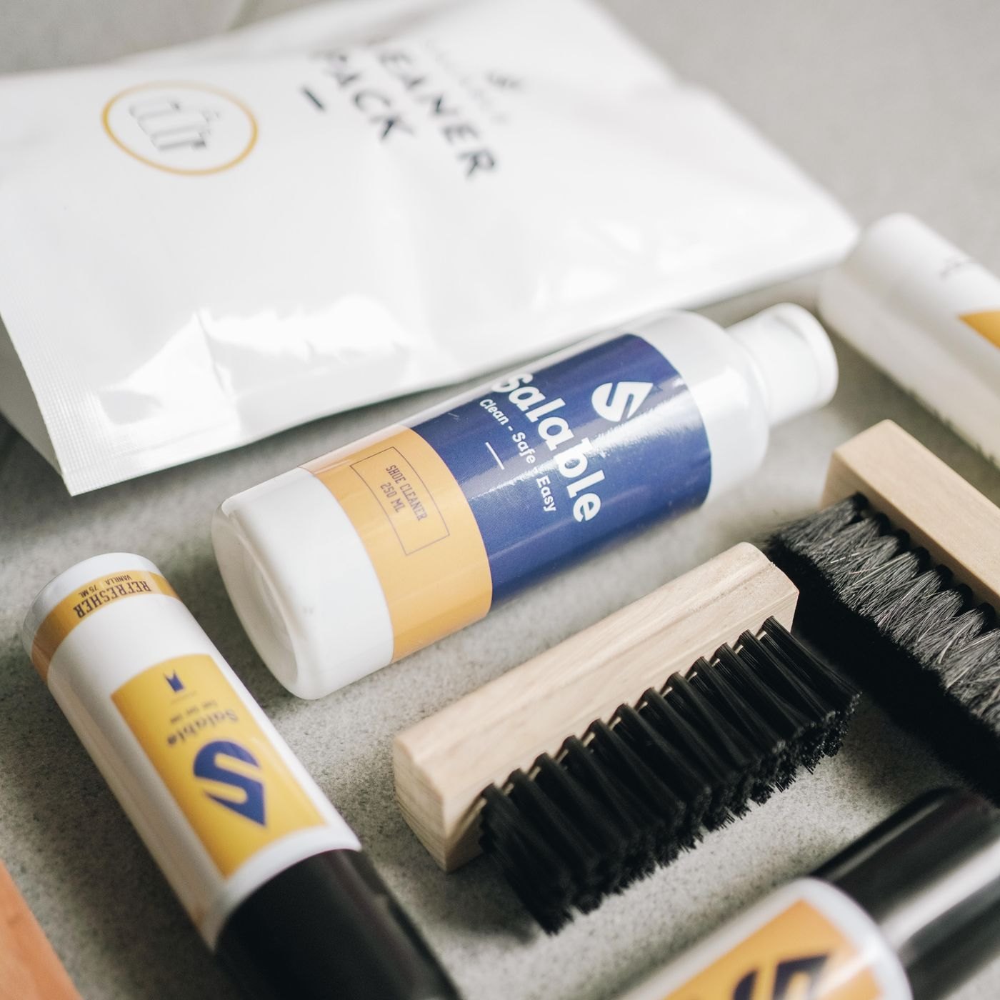 Shoe-cleaning brushes, cloths and supplies