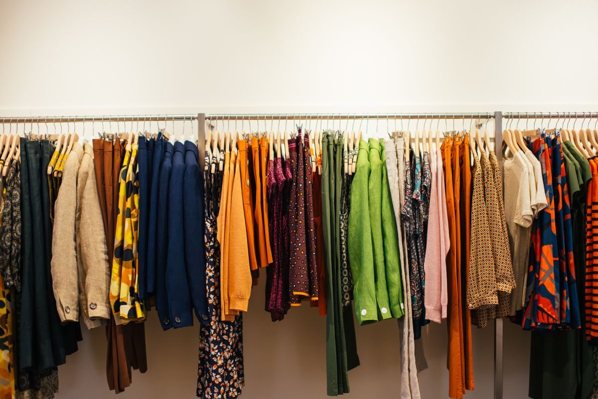 Clothes arranged along a single rail